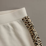 Elegant And Sporty Leopard Print Trim Off-white Knitted T-shirt And Flared Pants Set