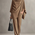 Two-piece set featuring a high-neck cape-style top and wide-leg trousers.