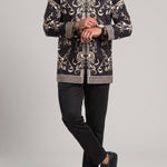 KZZ Men's two-piece set featuring a long-sleeved top and trousers with ethnic-style patterns.