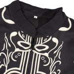 KZZ Men's two-piece set featuring a long-sleeved top and trousers with ethnic-style patterns.