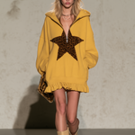 Mustard Yellow Half-zip Hooded Sweatshirt Dress Featuring Leopard-print Star Appliqués And A Ruffled Hem