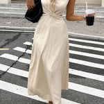 Solid Color Round Neck Sleeveless Hollowed-out Waist Knot Casual Maxi Dress