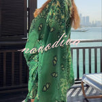 Sulena Linen Blend Ethnic Print Button Up Long Bell Sleeve Warp Tie-up Mini Dress