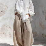 Casual white long-sleeve shirt and khaki trousers set