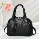 Céla Drip Satchel