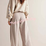 We The Free Denim Mid Rise Pocket Knotted Ankle Hem Lotus Balloon Jeans