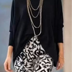 Black top and printed trousers set (accessories not included)