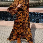 Brown long printed dress with wide sleeves