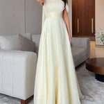 Cream Ribbon Off-shoulder Pleated Maxi Dress