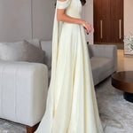 Cream Ribbon Off-shoulder Pleated Maxi Dress