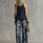 Séverine™ | Elegant navy halter neck top with printed wide-leg trousers