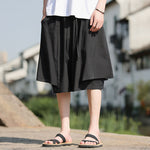 Ice Silk Loose Fake Two-piece Wide-leg Shorts