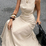 Solid Color Round Neck Sleeveless Hollowed-out Waist Knot Casual Maxi Dress