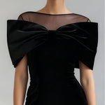 Elegant black velvet mini dress with bow