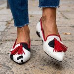 Ginevra Moccasin™ | Black and White Cow Print, Red Tassels